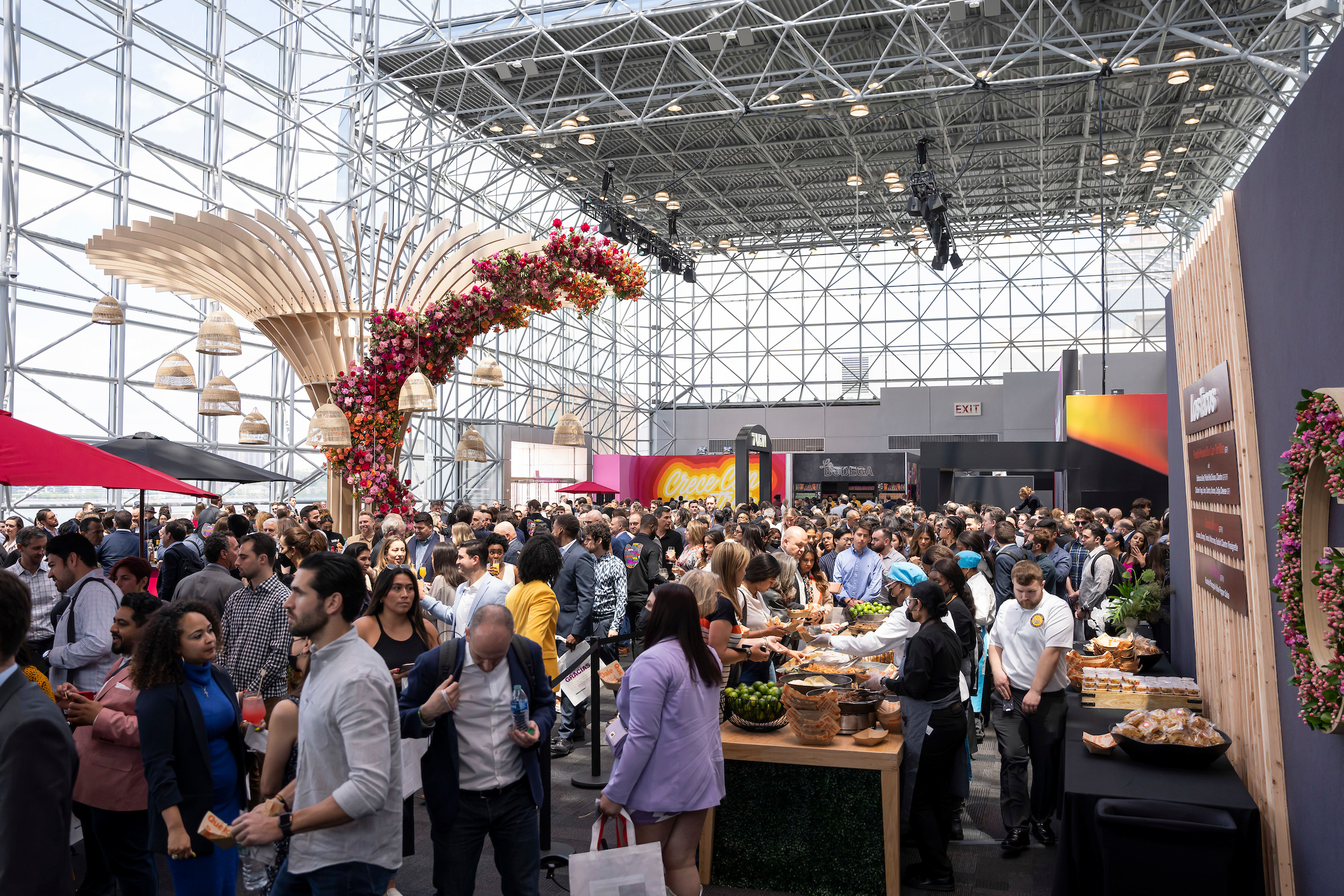 Large event with hundreds of people in an spacious event venue